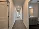 Hallway view of a bathroom at 5458 Summer Pine Pl, Buford, GA 30518
