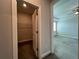 Walk-in closet with wire shelving located off the main bedroom at 5458 Summer Pine Pl, Buford, GA 30518