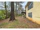The backyard features a deck with a view of the surrounding greenery and trees at , Stone Mountain, GA 30088