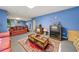 Cozy basement with blue walls, a seating area with a TV, and carpet at , Stone Mountain, GA 30088