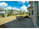 Spacious backyard with a concrete patio and a lush green lawn, perfect for outdoor activities at 2557 Staunton Dr, Duluth, GA 30097