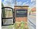 Bentwood at Sugarloaf community entrance sign on a brick pillar with black iron gate at 2557 Staunton Dr, Duluth, GA 30097