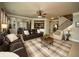 Inviting living room with plush seating, a cozy fireplace, and an open floor plan at 2557 Staunton Dr, Duluth, GA 30097