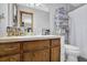 Bathroom featuring a sink and vanity with mirror at 525 Penny Ln, Woodstock, GA 30188