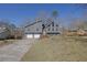 Well-maintained two-story home with a two-car garage and inviting front yard at 525 Penny Ln, Woodstock, GA 30188