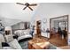 Comfortable living room with an open floor plan and stairs leading to an upper level at 525 Penny Ln, Woodstock, GA 30188