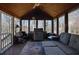 Sunroom with wood ceilings, grill, lots of natural light, and beautiful view at 525 Penny Ln, Woodstock, GA 30188