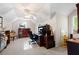 Bright office has vaulted ceiling, and desk for working from home at 5628 Harbormist Dr, Powder Springs, GA 30127