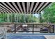 Back deck with an outdoor dining setup at 7020 Grassmoor Grange Way, Cumming, GA 30040
