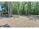 An expansive backyard featuring ample room for outdoor activities and landscaping possibilities at 7020 Grassmoor Grange Way, Cumming, GA 30040