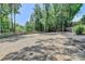 A spacious backyard featuring ample room for outdoor activities and landscaping possibilities at 7020 Grassmoor Grange Way, Cumming, GA 30040