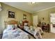 Bedroom with twin beds, artwork, and neutral colored walls at 7020 Grassmoor Grange Way, Cumming, GA 30040
