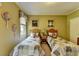 Bedroom with twin beds, artwork, and neutral colored walls at 7020 Grassmoor Grange Way, Cumming, GA 30040