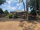 Home exterior with a large deck and a landscaped backyard at 7020 Grassmoor Grange Way, Cumming, GA 30040