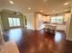 White kitchen with an eat-in island and stainless steel appliances at 7020 Grassmoor Grange Way, Cumming, GA 30040
