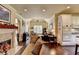 Cozy living area featuring hardwood floors, a fireplace, and an inviting layout for relaxation at 7020 Grassmoor Grange Way, Cumming, GA 30040
