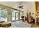 Sun room with an outdoor view, and furniture at 7020 Grassmoor Grange Way, Cumming, GA 30040