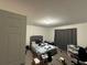 This bedroom provides ample space and natural lighting at 136 Swindon Dr, Mcdonough, GA 30253