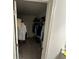 Walk-in closet with clothing racks and shelves, offering ample storage space at 136 Swindon Dr, Mcdonough, GA 30253