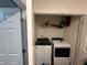 Convenient laundry closet with washer and dryer at 136 Swindon Dr, Mcdonough, GA 30253