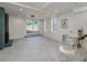 Large basement with fireplace and walkout to the backyard complemented by bar area, perfect for entertaining and relaxation at 2569 Woodhill Ln, Atlanta, GA 30344