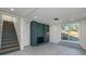 Finished basement with tile floors, brick fireplace, and walkout access to the backyard; great for additional living space at 2569 Woodhill Ln, Atlanta, GA 30344