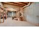 Unfinished basement with exposed wooden framing and concrete walls ready for customization at 3902 Butterstream Nw Way, Kennesaw, GA 30144