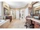 Elegant bathroom with dual vanities, soaking tub, glass-enclosed shower, and decorative tile flooring at 3902 Butterstream Nw Way, Kennesaw, GA 30144
