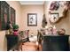 Elegant powder room featuring a unique vanity, artistic decor and hardwood floors at 3902 Butterstream Nw Way, Kennesaw, GA 30144