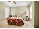 Cozy bedroom showcasing neutral tones, ample natural light, and a comfortable bed setup at 3902 Butterstream Nw Way, Kennesaw, GA 30144