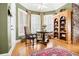 Charming breakfast nook with ample light, and built-in bookshelves; perfect for enjoying morning coffee at 3902 Butterstream Nw Way, Kennesaw, GA 30144