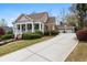 Lovely home with a long driveway, well-maintained lawn, and a detached garage at 3902 Butterstream Nw Way, Kennesaw, GA 30144