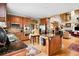 Spacious kitchen featuring wood cabinets, stainless steel appliances, granite countertops, and a center island at 3902 Butterstream Nw Way, Kennesaw, GA 30144