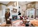 Sophisticated living room with fireplace, custom shelving and stylish furnishings at 3902 Butterstream Nw Way, Kennesaw, GA 30144