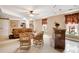 Bright living room featuring cozy seating, built-in shelves, and decorative stained glass windows at 3902 Butterstream Nw Way, Kennesaw, GA 30144