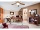 Home office with desk, bookshelves, and sitting area at 3902 Butterstream Nw Way, Kennesaw, GA 30144