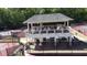 Multiple well-maintained tennis courts with an elevated viewing platform for spectators at 3902 Butterstream Nw Way, Kennesaw, GA 30144