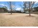 Expansive backyard with a private wooded view and fence around perimeter at 4535 Meadow Green Ln, Acworth, GA 30101