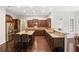 Spacious kitchen with stainless steel appliances, granite countertops, and wooden cabinets at 4535 Meadow Green Ln, Acworth, GA 30101
