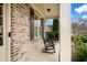 Inviting front porch with rocking chairs, perfect for relaxing and enjoying the outdoors at 4535 Meadow Green Ln, Acworth, GA 30101