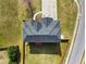 Aerial view of the house showcases the roof, landscaping, driveway and large, fenced backyard at 6793 Oconee Pl, Fairburn, GA 30213