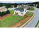 Aerial image of a home's backyard, fenced in for privacy, in its neighborhood setting at 6793 Oconee Pl, Fairburn, GA 30213