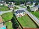 Aerial view of the home with a fenced backyard, nearby roads, and neighborhood at 6793 Oconee Pl, Fairburn, GA 30213