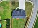 A house with a new roof and an expansive backyard with a wooden fence ensuring privacy in a serene neighborhood setting at 6793 Oconee Pl, Fairburn, GA 30213
