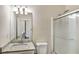 Clean bathroom showcasing granite countertops, a shower, and a modern sink at 6793 Oconee Pl, Fairburn, GA 30213