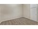 Bedroom with neutral carpet and white walls, plus a closet for storage at 6793 Oconee Pl, Fairburn, GA 30213