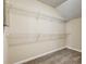 Walk-in closet featuring wire shelving for storage at 6793 Oconee Pl, Fairburn, GA 30213