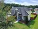 Charming two-story home showcasing a manicured lawn and mature trees in a residential neighborhood at 6793 Oconee Pl, Fairburn, GA 30213