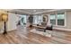 Spacious finished basement with hardwood floors, offering ample room for entertaining and relaxation at 8070 Georgetown Cir, Suwanee, GA 30024