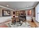 Formal dining room with stylish furnishings, area rug, and modern artwork at 8070 Georgetown Cir, Suwanee, GA 30024